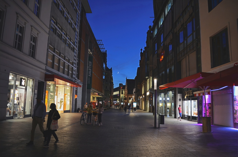 14 - A street scene in Dortmund, Germany, specifically featuring the Westenhellweg shopping area at night